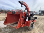 Used Brush Chipper in yard